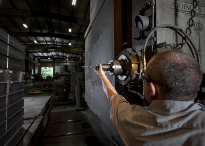 Victor Enterprises | Precision Machine Shop | Staff Member Working with the Drill